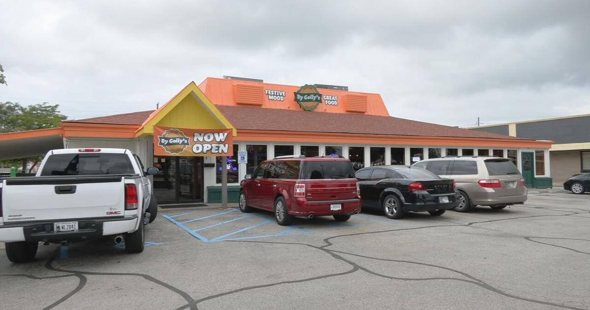 New pub-style restaurant opens in former southern Indiana Hooters location – WDRB Modern restaurant exterior with parking lot, featuring signage for By Golly's and open status. Ideal for SEO targeting local dining, family-friendly restaurants, and casual eateries.