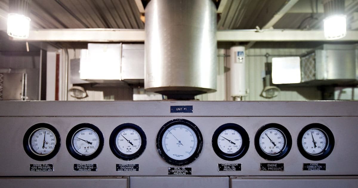 Caterpillar emerges as unlikely AI winner on turbine demand – Dallas News Gas engine gauges in industrial engine control panel at Steve D. deGuzman facility, showcasing mechanical instrumentation and engine performance monitoring.